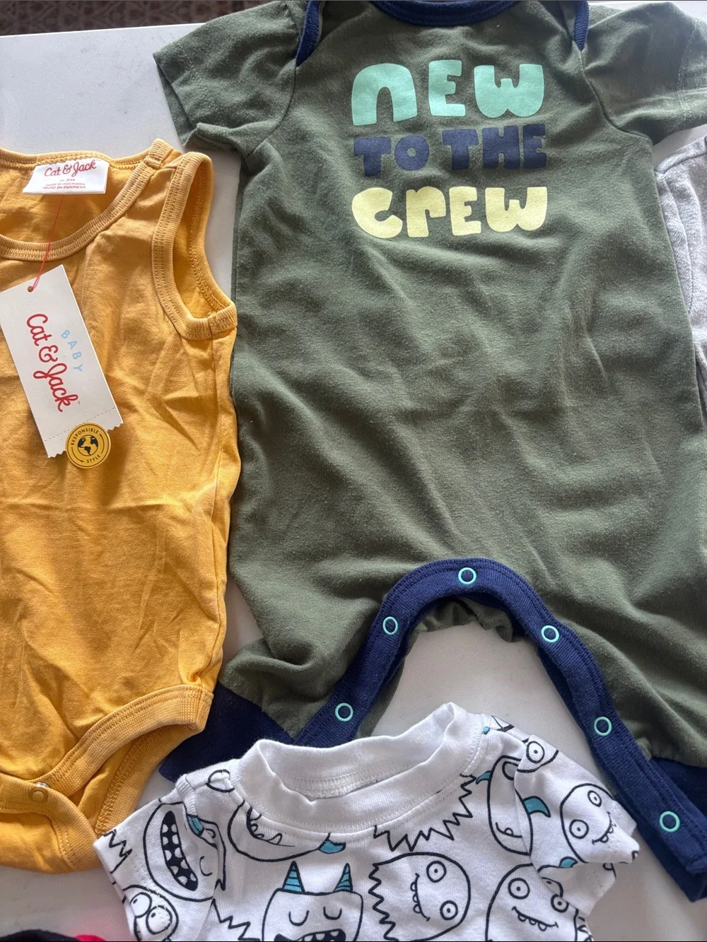 Mixed Baby Onesie & Sleepwear Bundle - Neutral, Yellow, Red newborn